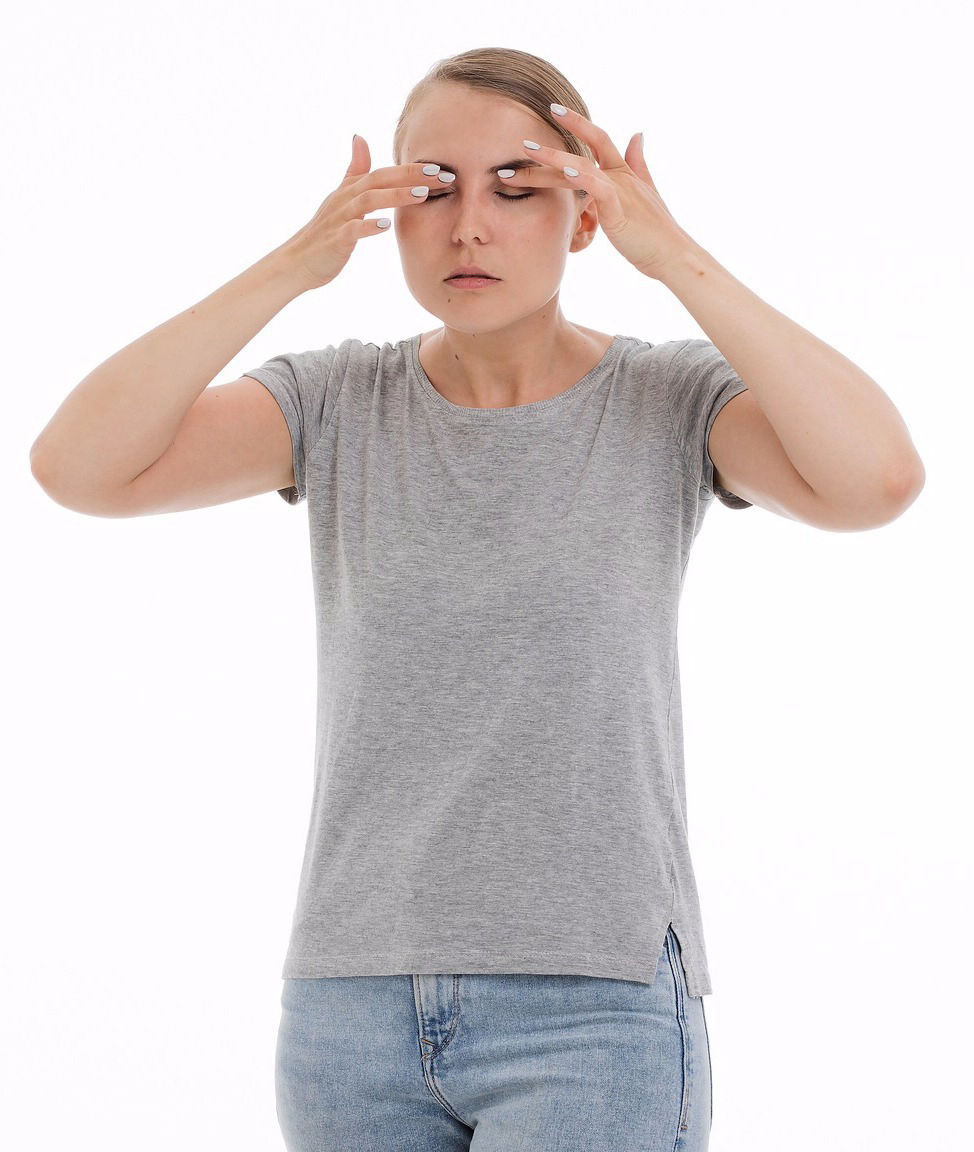 A Lady in a Headache | Amarillo Chiropractor | New Life Chiropractic